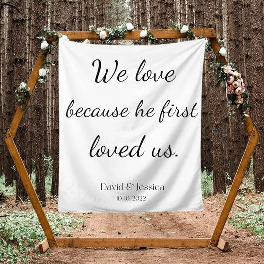 We Love Because He First Loved Us Backdrop,Custom Tapestry with Names and Date,Rustic Wedding Sign,Personalized Calligraphy Wedding Banner for Ceremony,Reception Backdrop,One Size